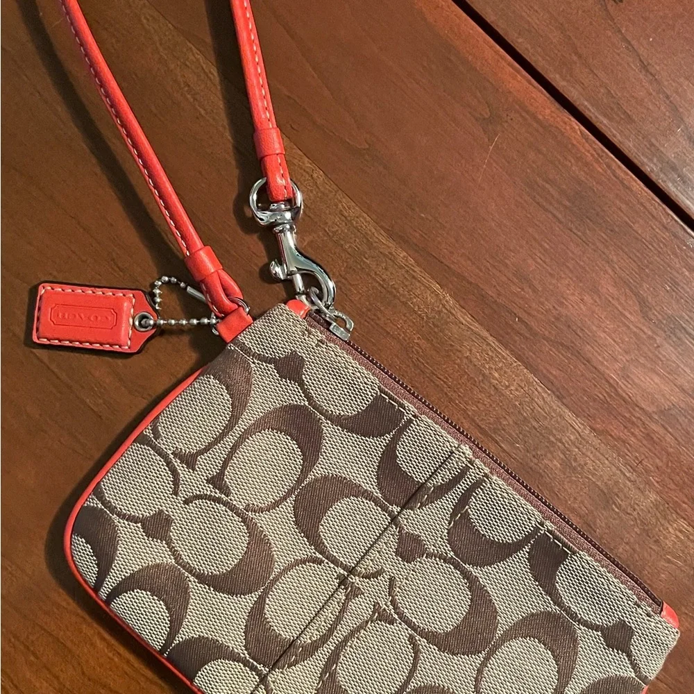 COACH Signature Fabric with Orange Leather Wristlet
